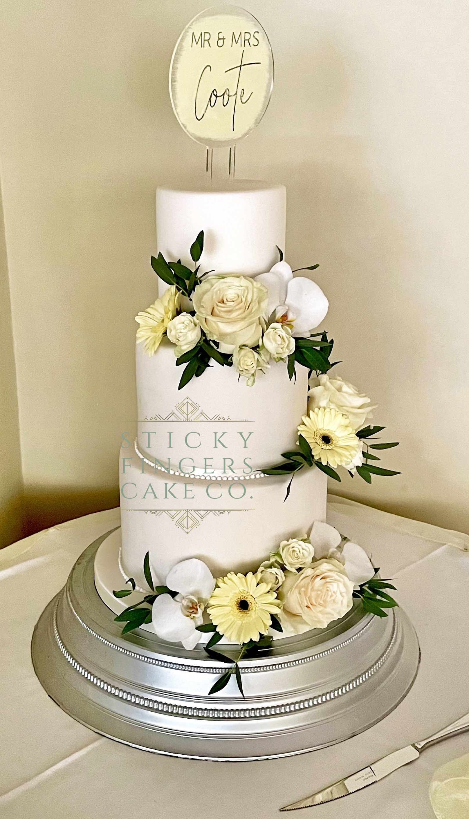 3-tier Floral Wedding Cake displayed at The Rochford Hotel, Rochford