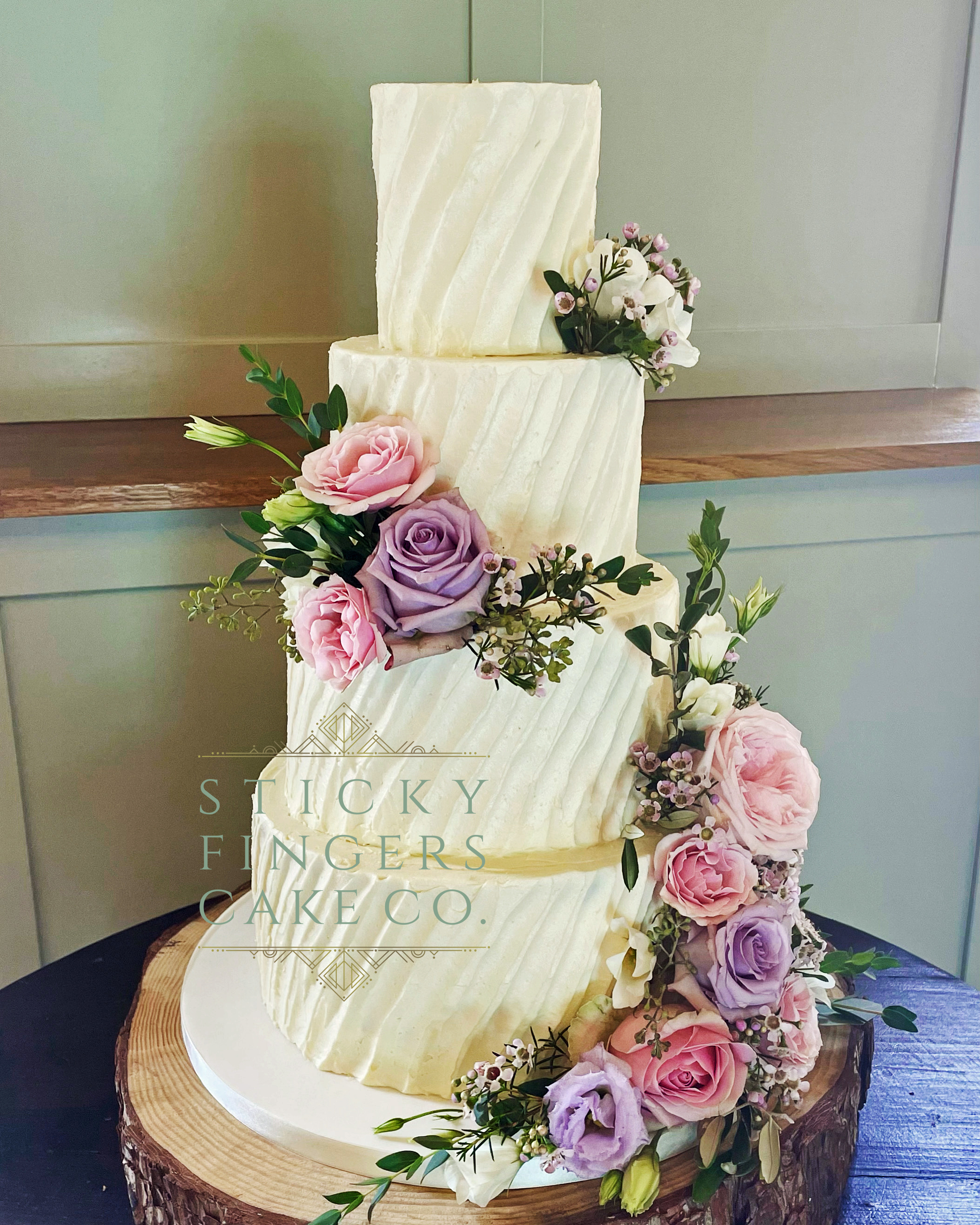4-tier Buttercream Wedding Cake displayed at Apton Hall, Rochford