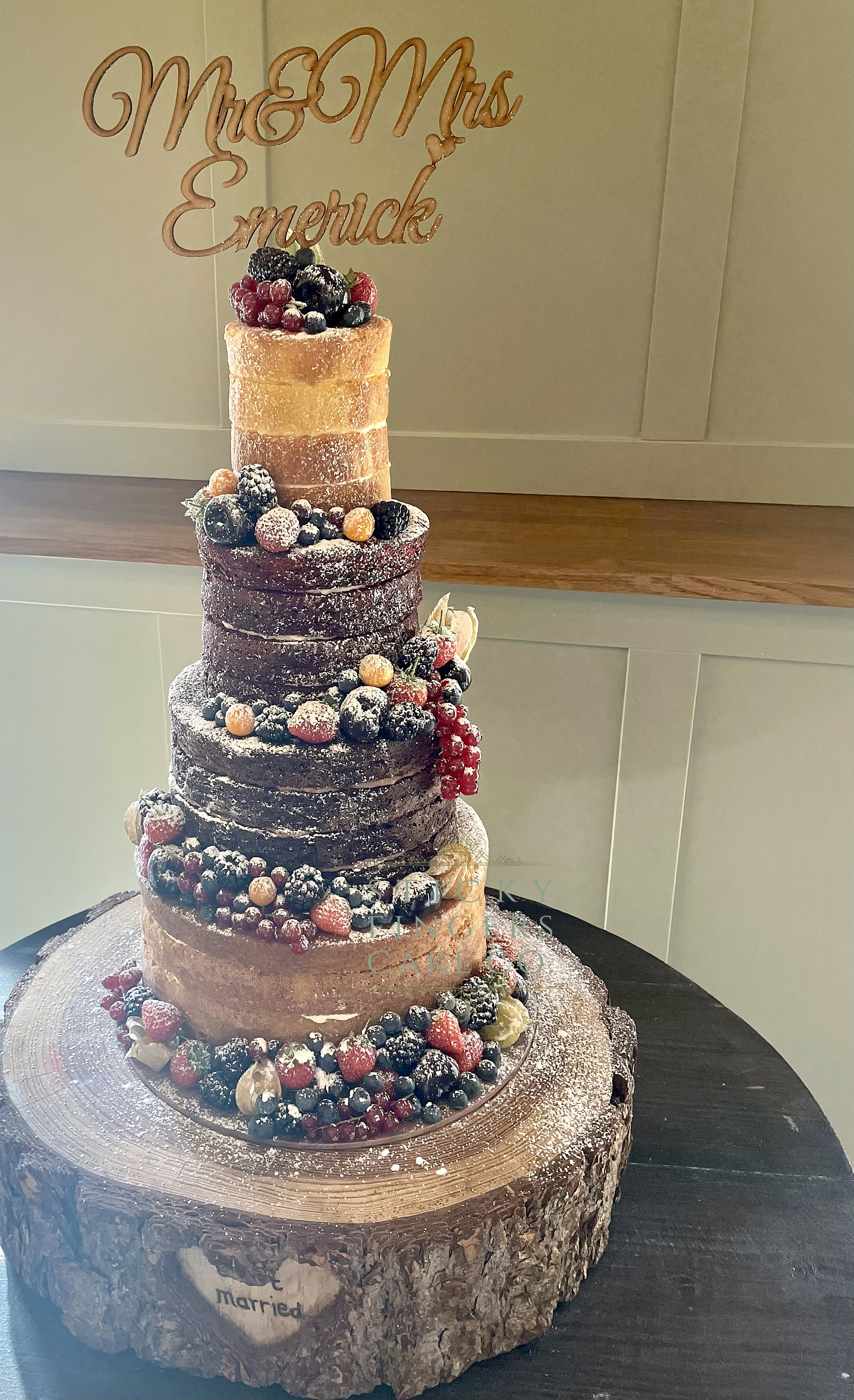 4-tier Naked Wedding Cake displayed at Apton Hall, Rochford
